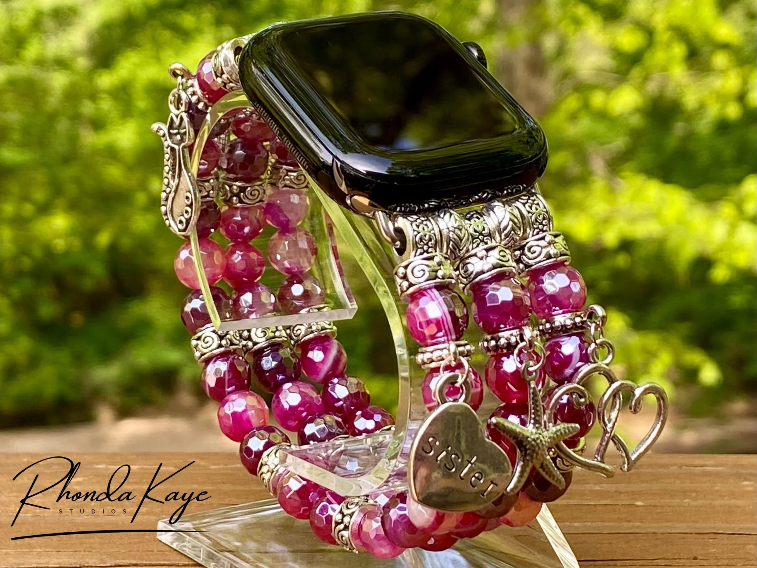 Charmed Razzle Rose Band Front Woods.jpg
