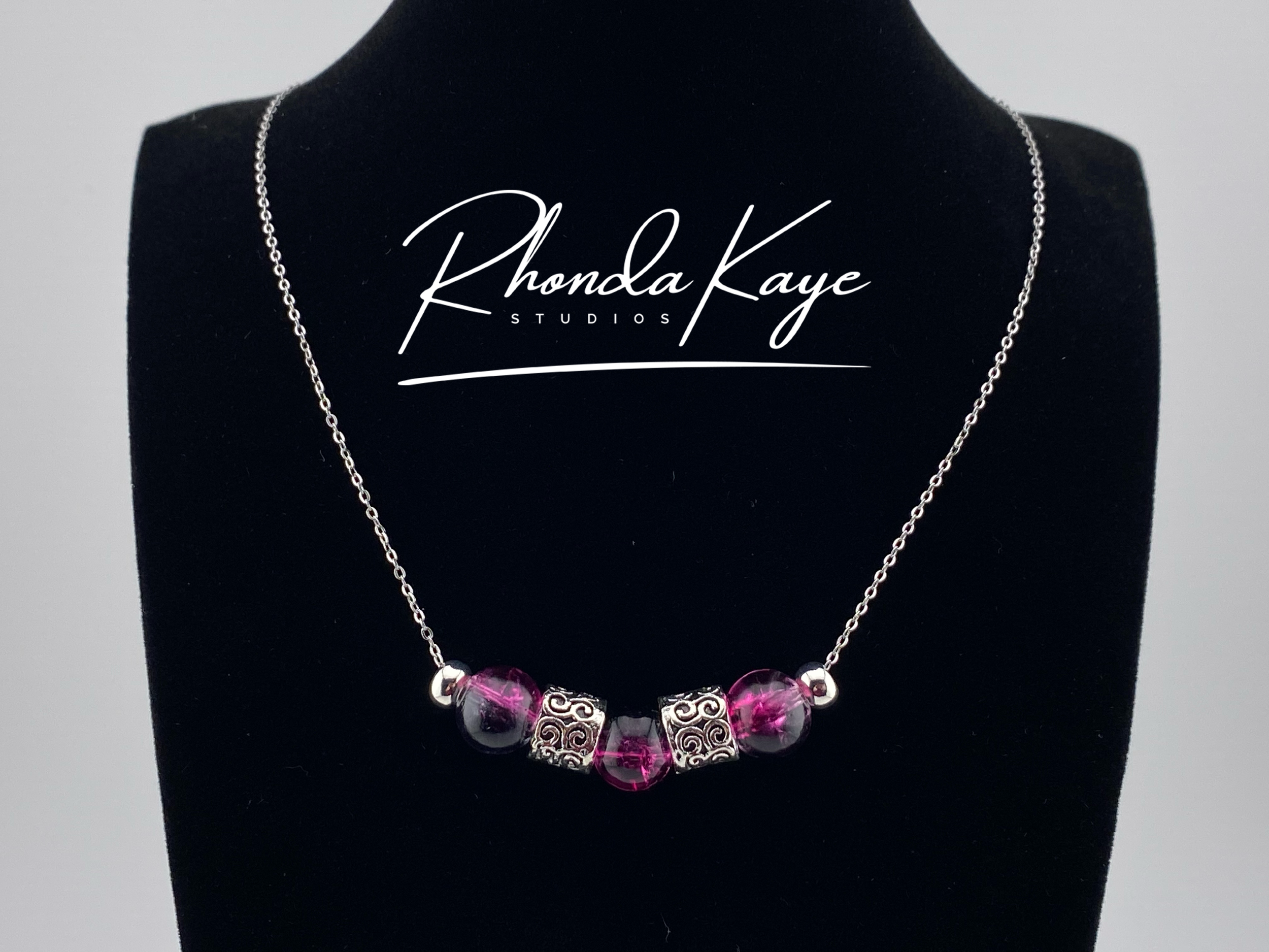 Black Orchid Necklace Chain Logo.png