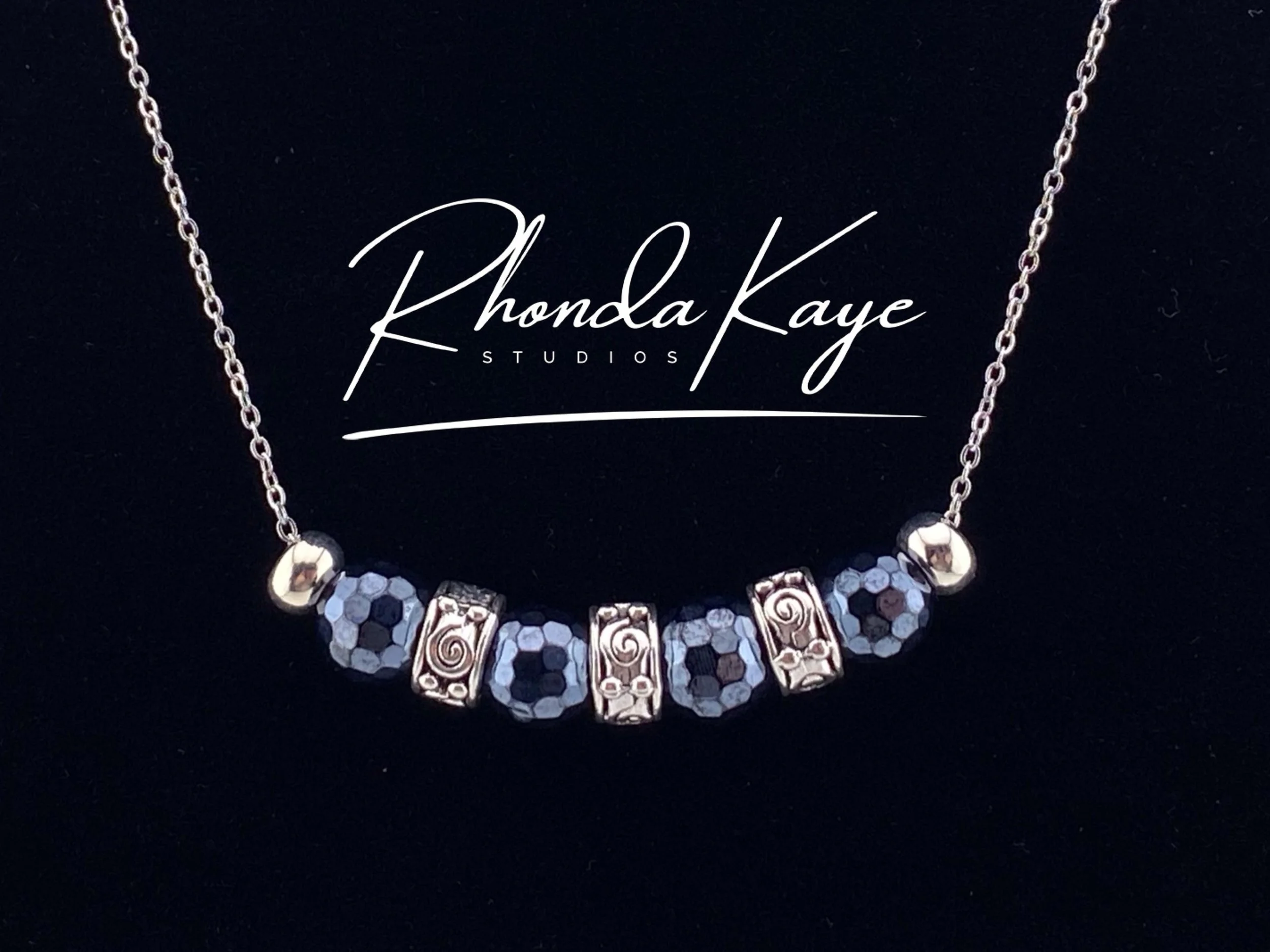 Black Tie Necklace Black background.jpg