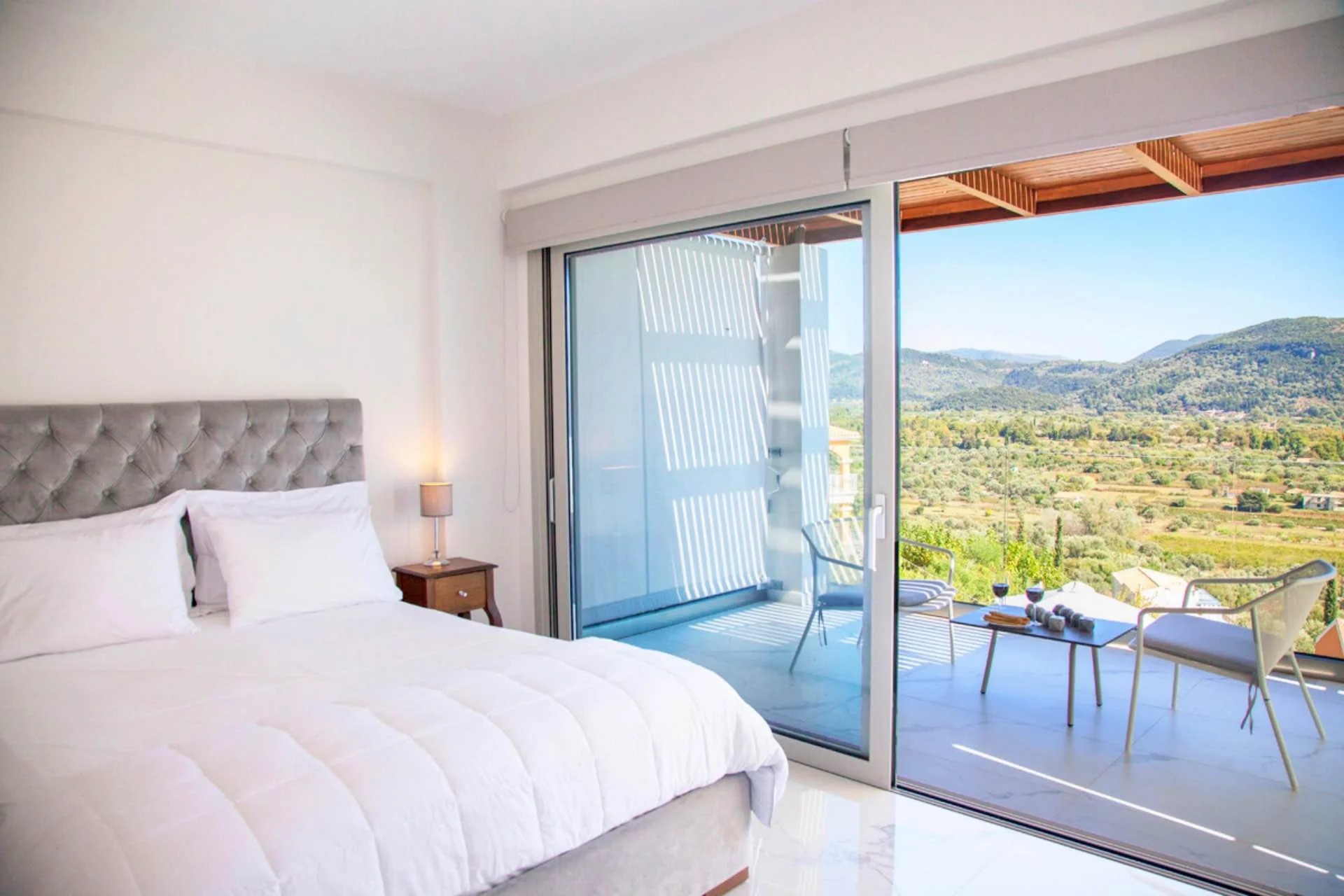 13-villa-o-offwhite-vasiliki-lefkada-greece-bedroom-upper-level-master-private-balcony-mountain-view-1.jpg