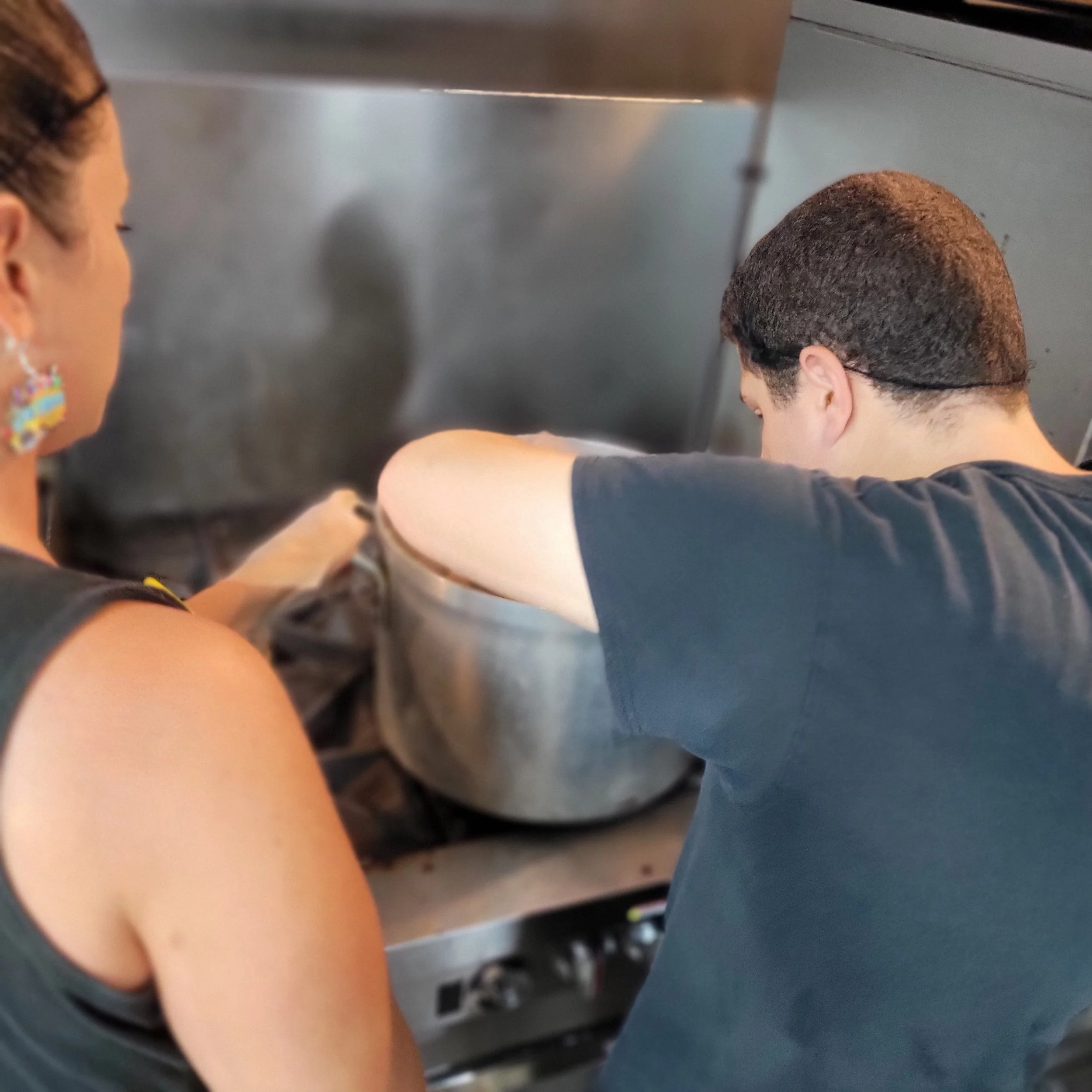 Young adult with a disability learning hospitality skills