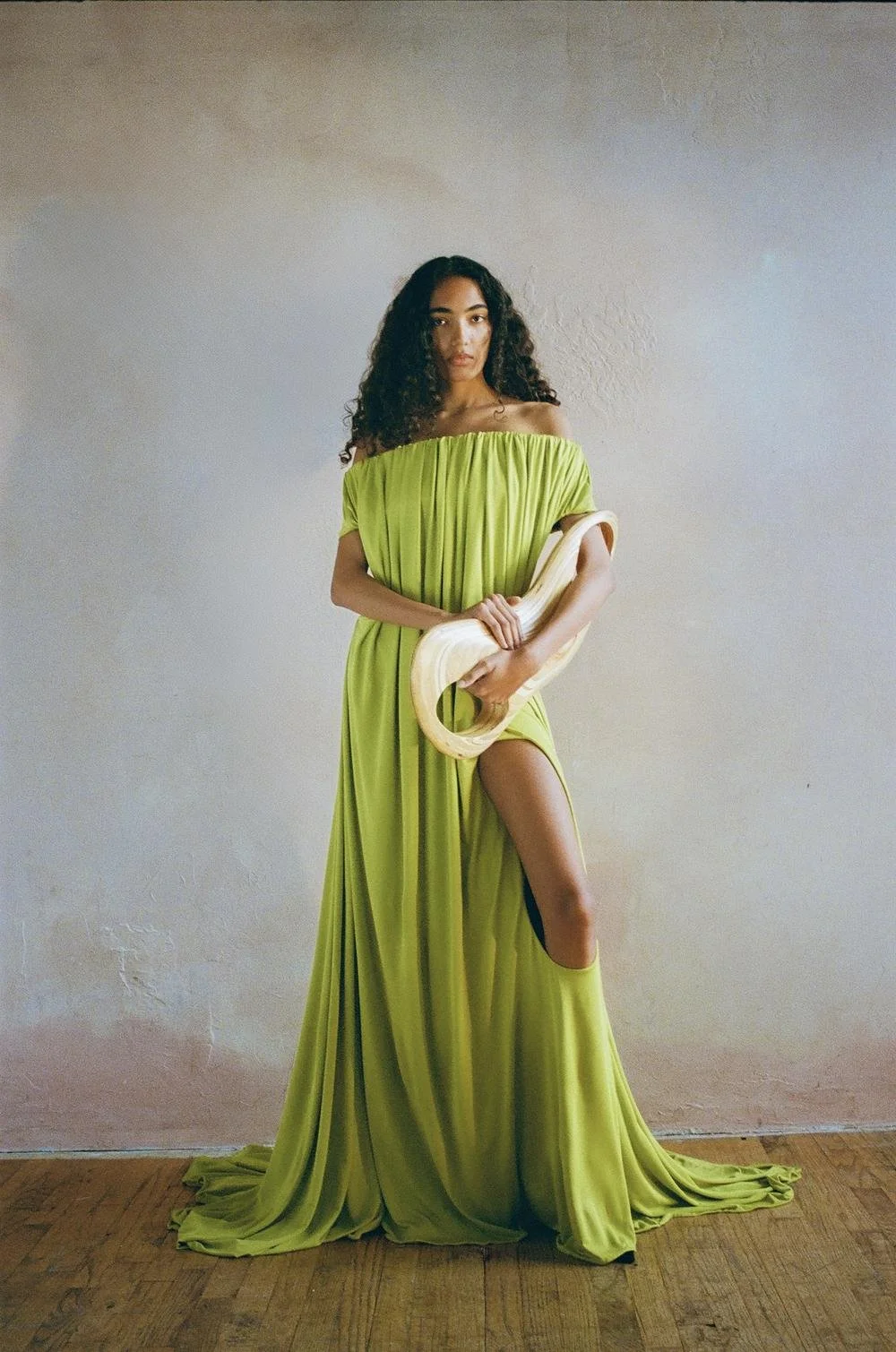 Gathered silk jersey sport gown with leg hole cut out that loops around the knee. With built in mesh body suit and backless drop. Alongside a CNC-wood cut bag developed alongside industrial Paul Howell, who modeled the shape on rhino, while I began s