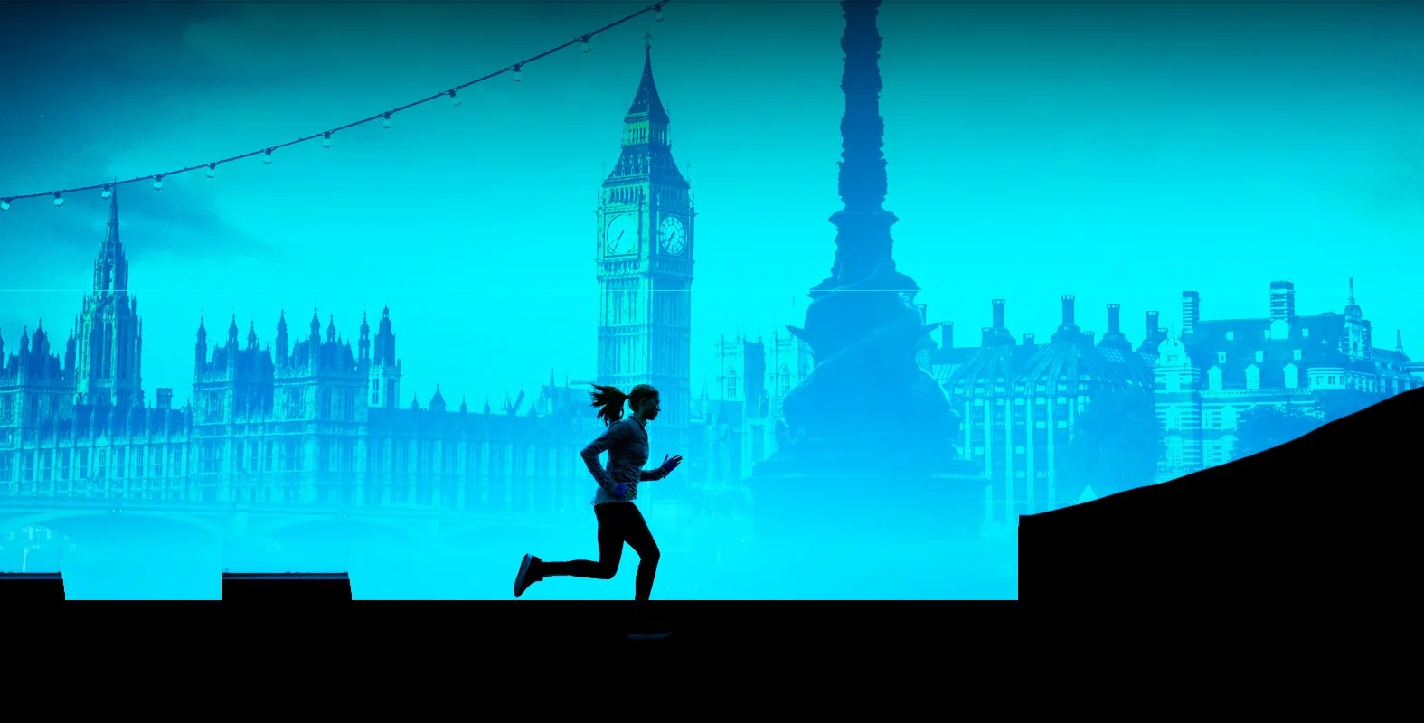 A woman jogging on a black surface with a blue cityscape background featuring Big Ben and the Houses of Parliament in London at dusk or dawn.