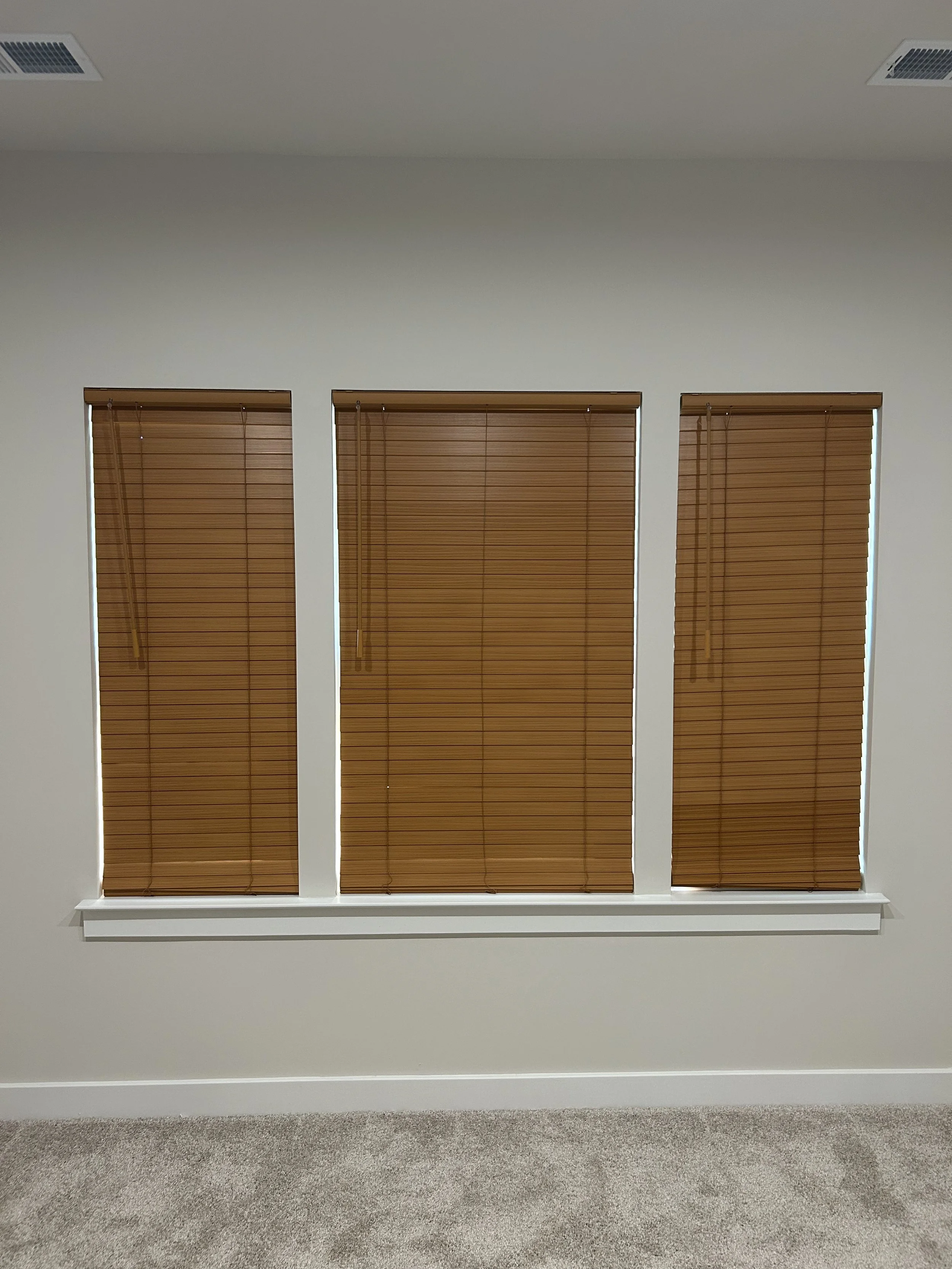Three wooden blinds in Albertville, Alabama