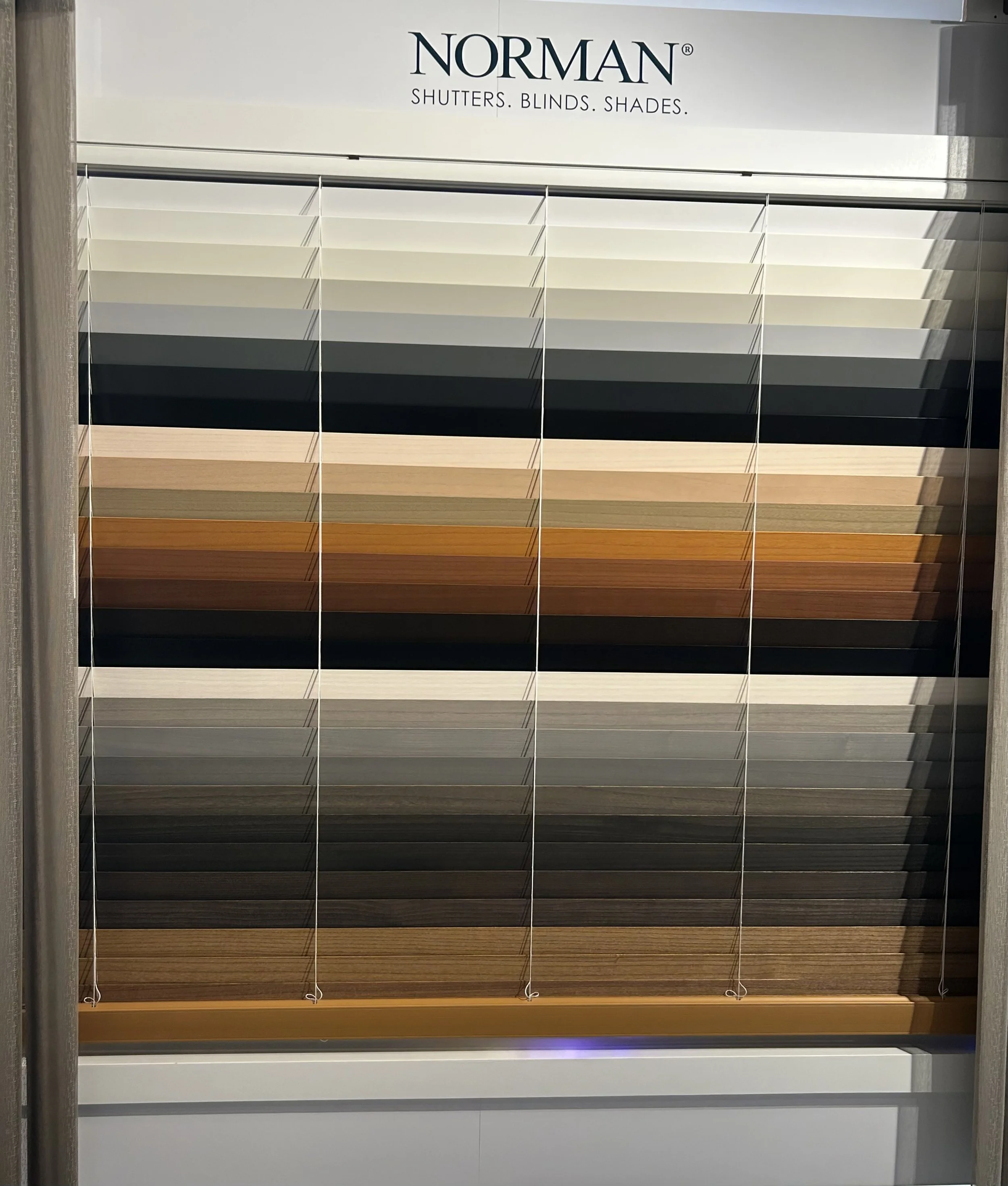 Display of color and finish samples for blinds by Norman
