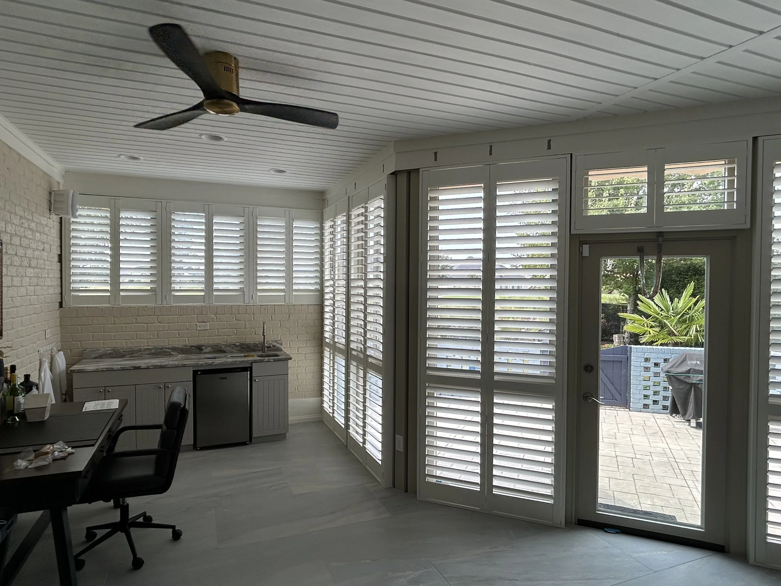 Custom Shutters in a sunroom in Guntersville, Alabama