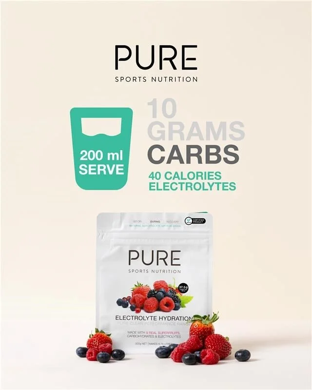 Package of PURE sports nutrition electrolyte hydration powder with mixed berries, emphasizing 10 grams of carbs, 40 calories, and electrolytes, with a measuring scoop indicating 200 ml serve.