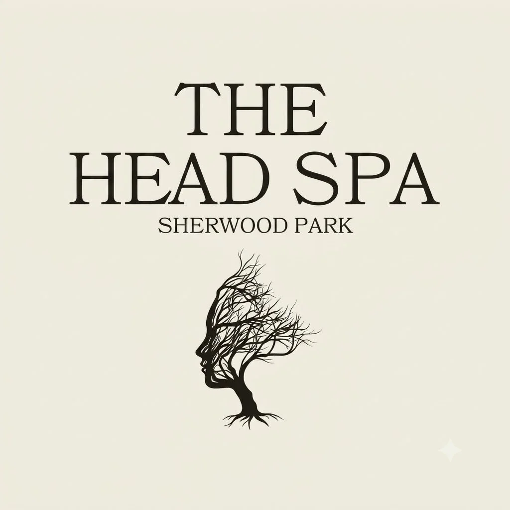 Logo for The Head Spa at Sherwood Park, featuring a stylized tree with branches forming a face in profile.