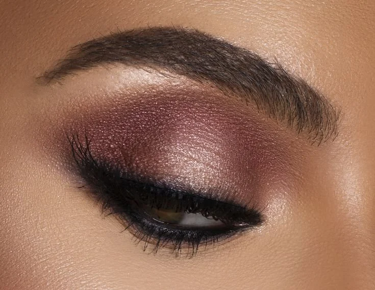 Soft plum smoky eye makeup for NFR Las Vegas western glam