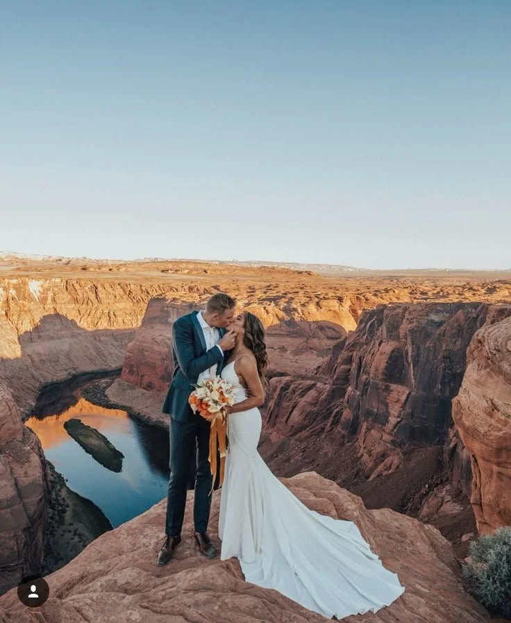 bride and groom on mountain in arizona at wedding with soft bridal makeup by salterra collective