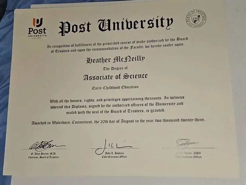 Diploma from Post University awarded to Heather McNeilly for completing coursework in the Associate of Science program, dated August 20, 2023.
