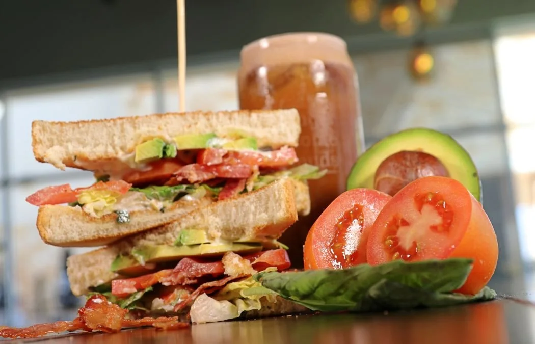 Close-up of Duino's A-BLT sandwich, lettuce, tomato, avocado, bacon, and mayonnaise
