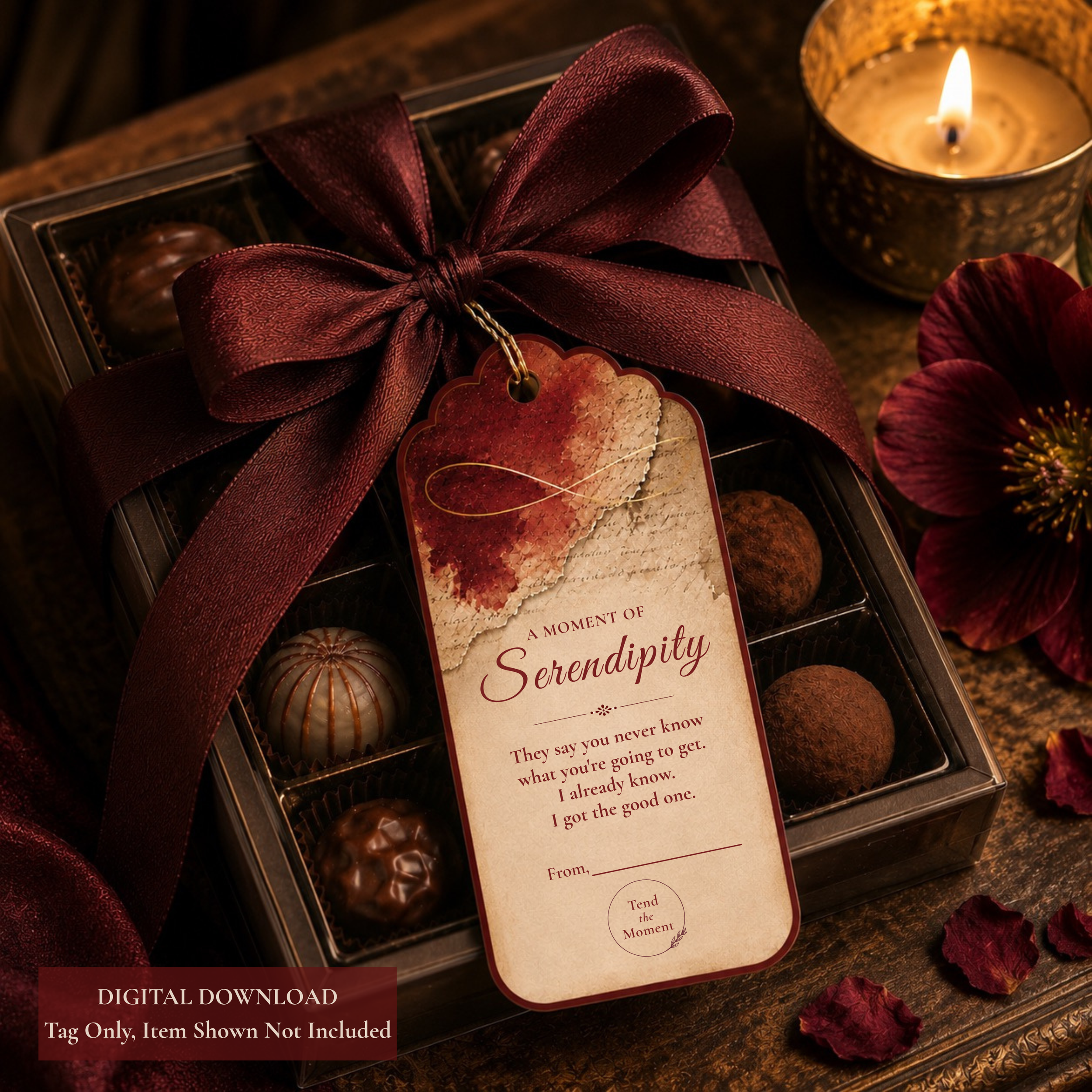 Tend the Moment keepsake gift tag attached to a gift box wrapped with a burgundy ribbon.