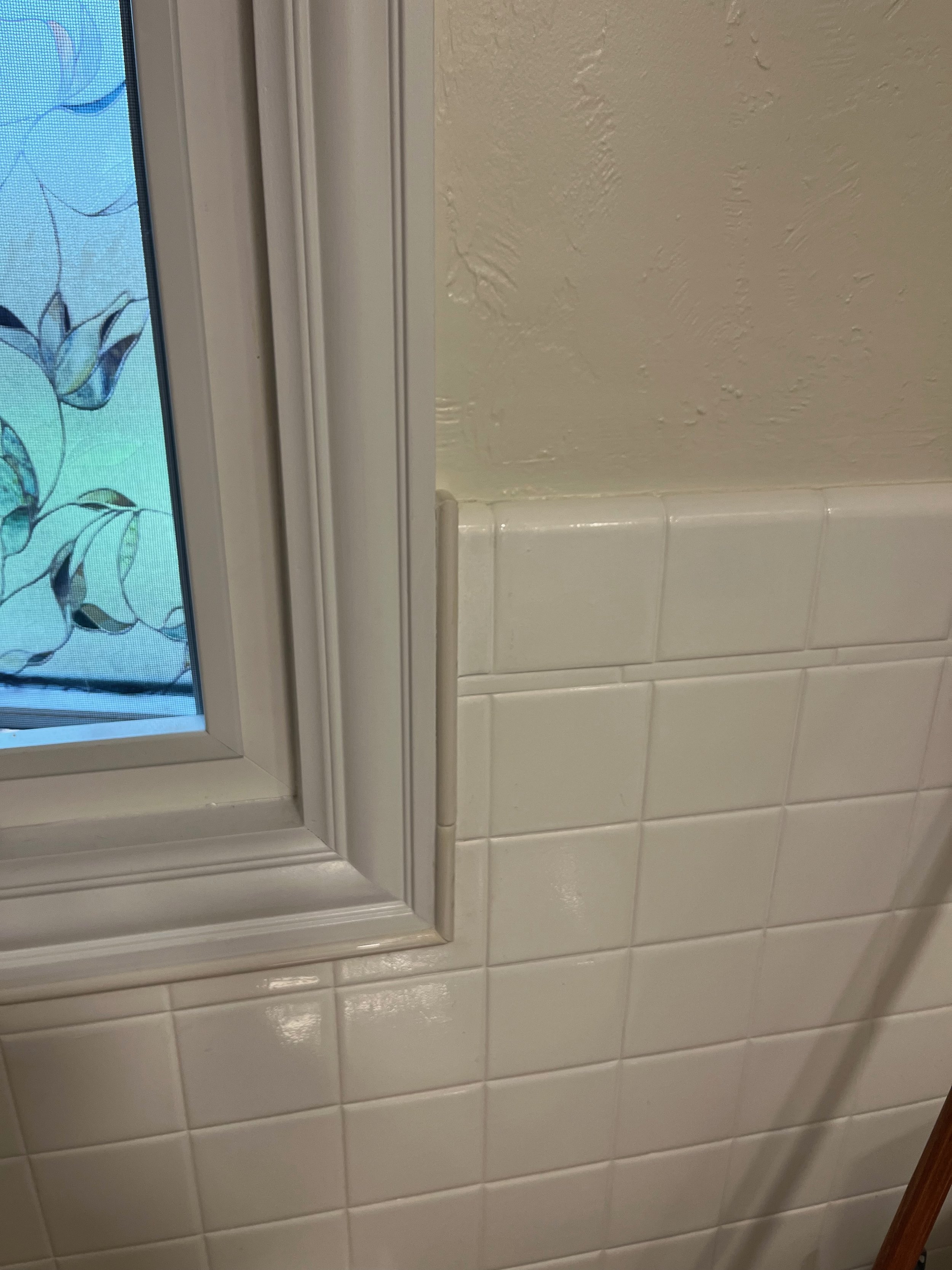 Cracked bathroom tile after