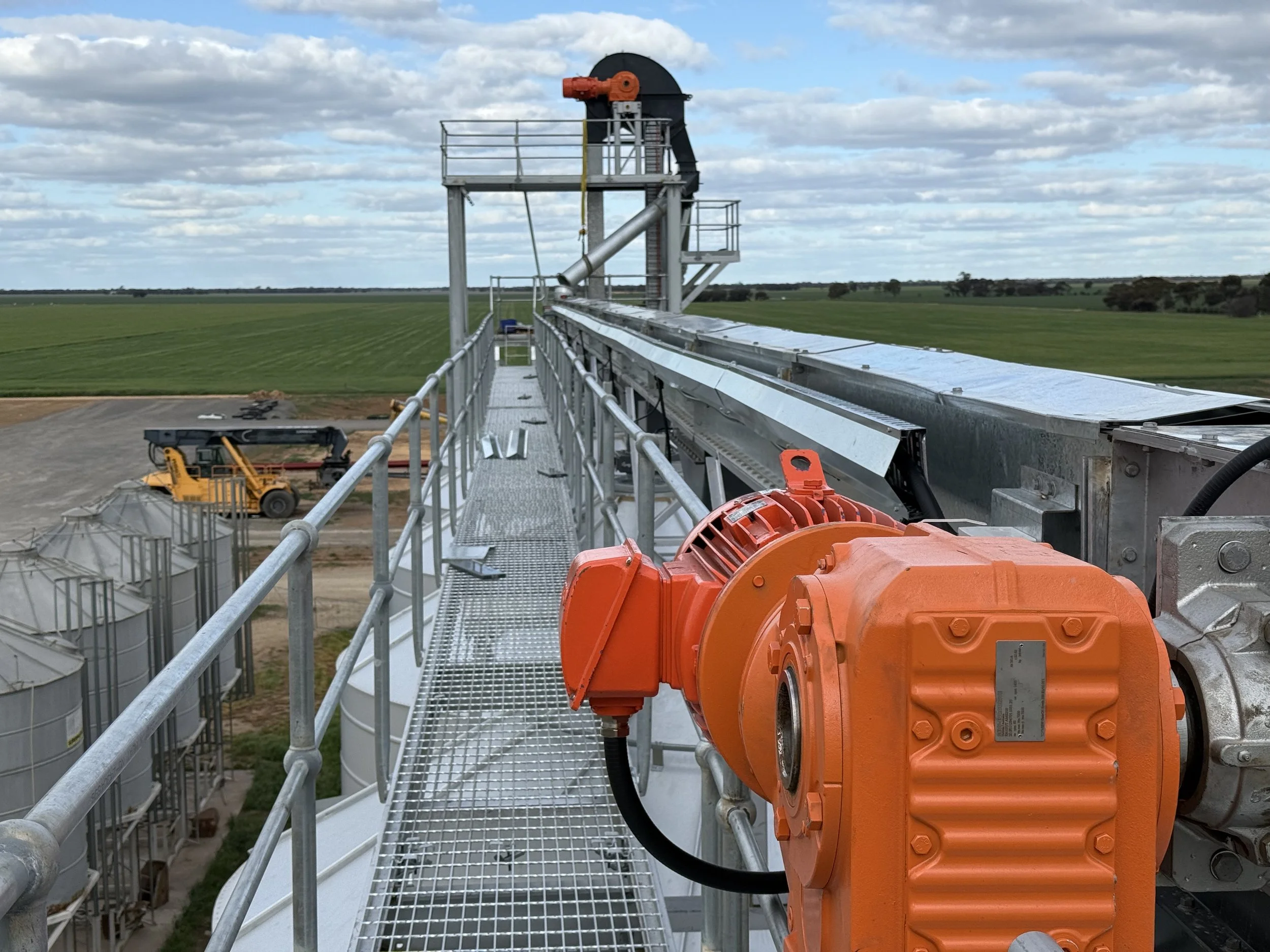 Grain handling conveyor system with electric motor and industrial electrical equipment
