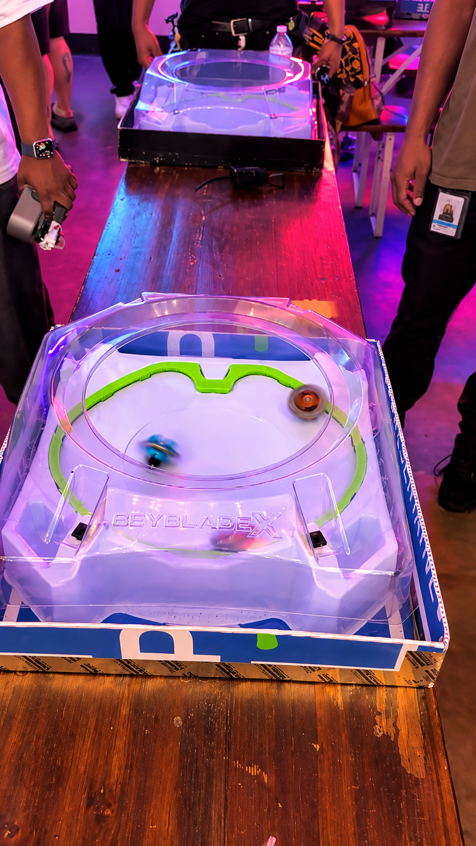 Neon Beyblade Battle on Display.png