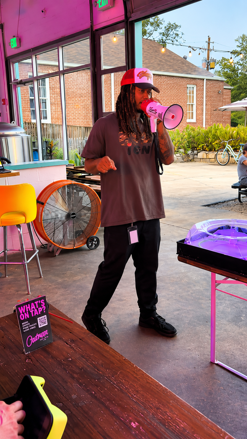 Megaphone Host at the Neon Taproom.png