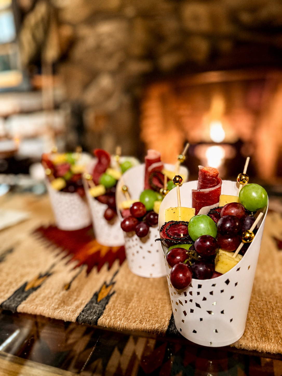 Curated food and beverage setup with wine, snacks and refreshments for a Colorado vacation stay or celebration