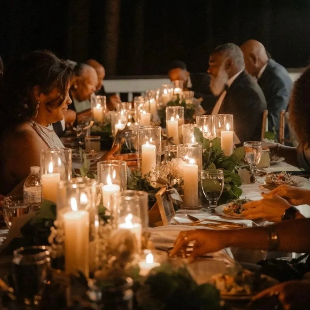 Private chef experience with guests enjoying an intimate candlelight dinner prepared in their vacation rental