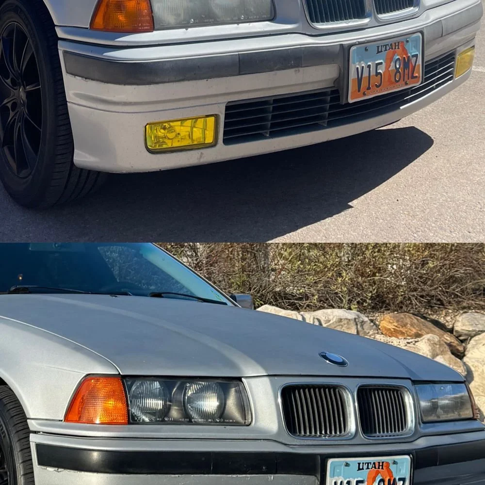 Two front views of vintage BMW cars parked outdoors. The top car has a yellow front reflector and an Utah license plate reading V15 8MZ. The bottom car features a distinctive kidney grille, headlights, and a similar Utah license plate.
