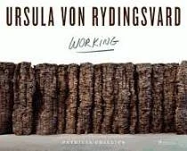 Close-up of a logs or wood logs stacked horizontally, with text 'Ursula von Rydingsvard' and 'Working' above the logs.