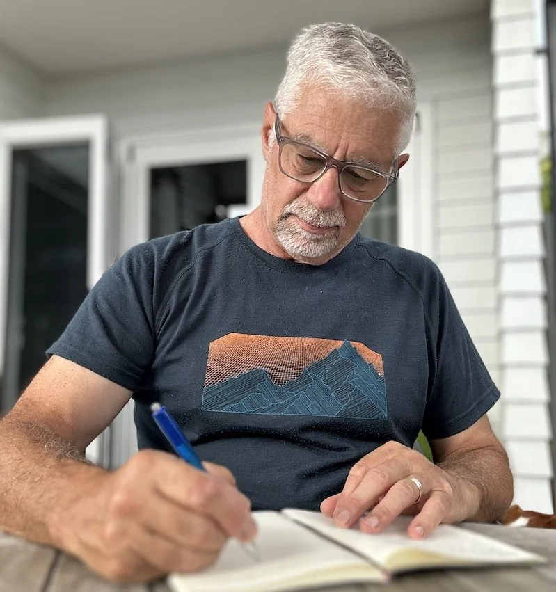 Midlife man writing in journal