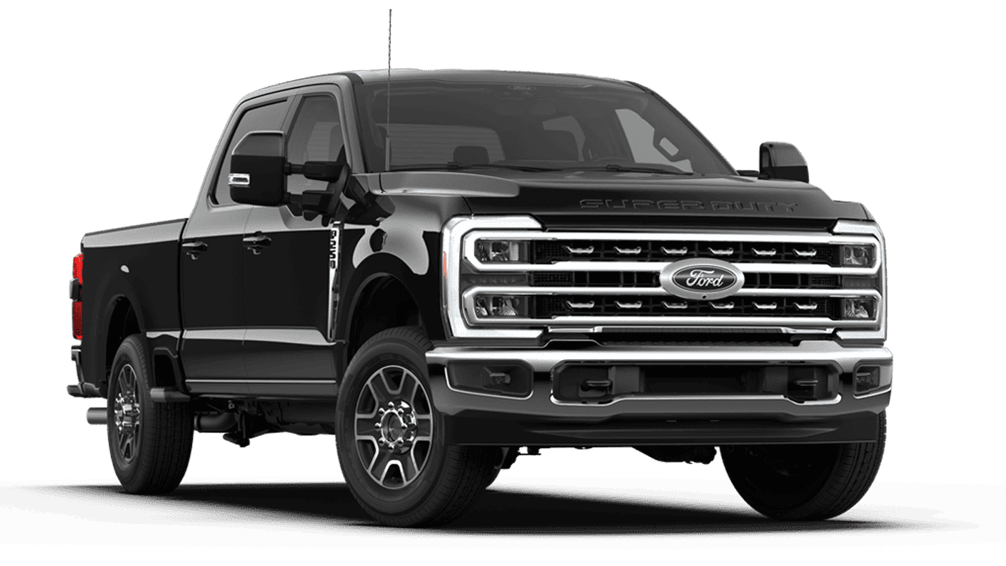 Front view of a black and silver Ford Super Duty pickup truck on a black background.
