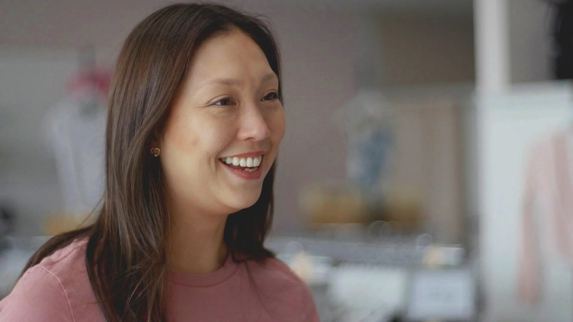 Anna Wassman, an Asian American women has the biggest smile.