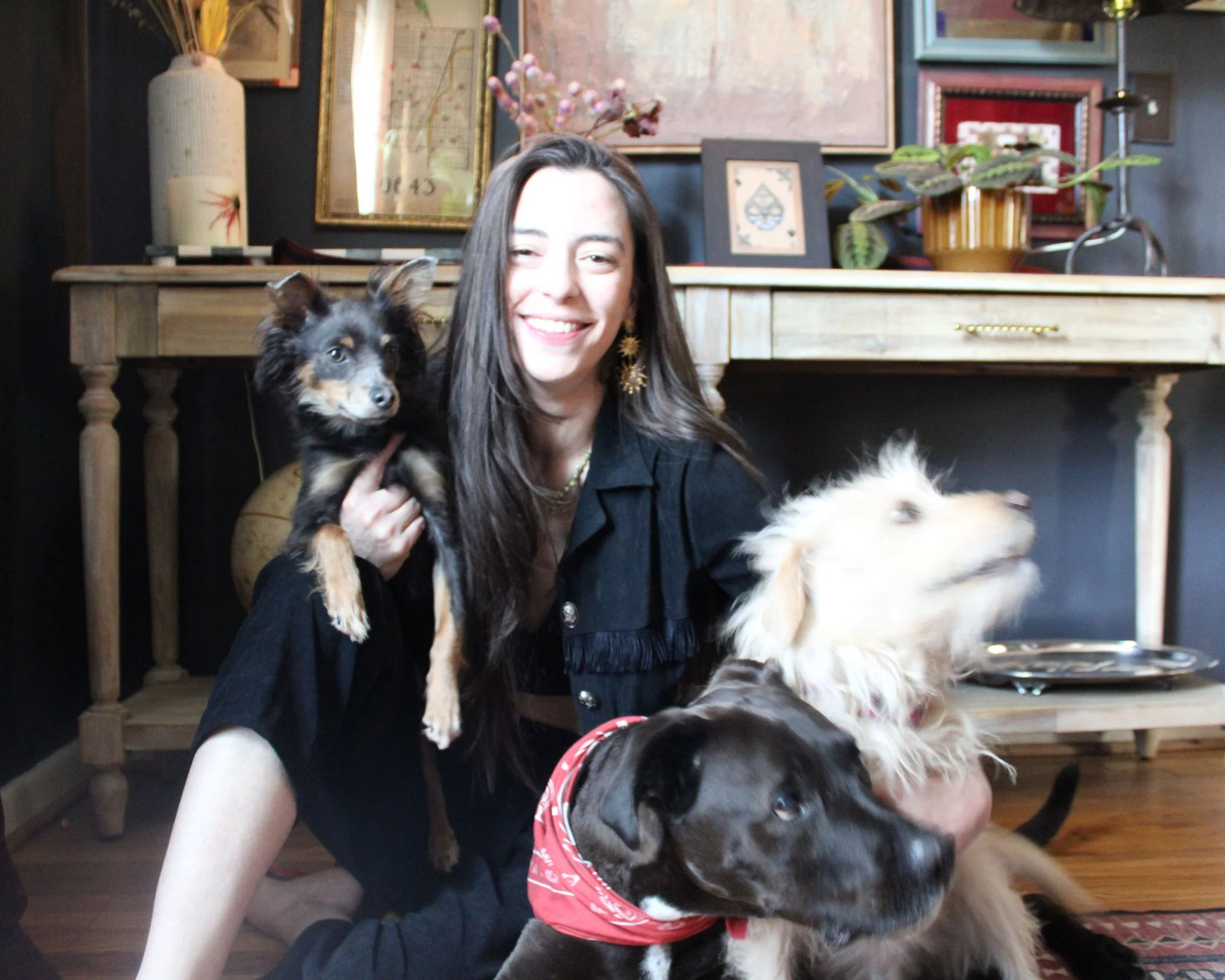 Owner of Sammy Boy Vintage with her three rescue dogs who inspired this shop