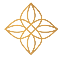 A glowing, illuminated decorative pattern with four petal-like shapes forming a symmetrical design against a dark background.