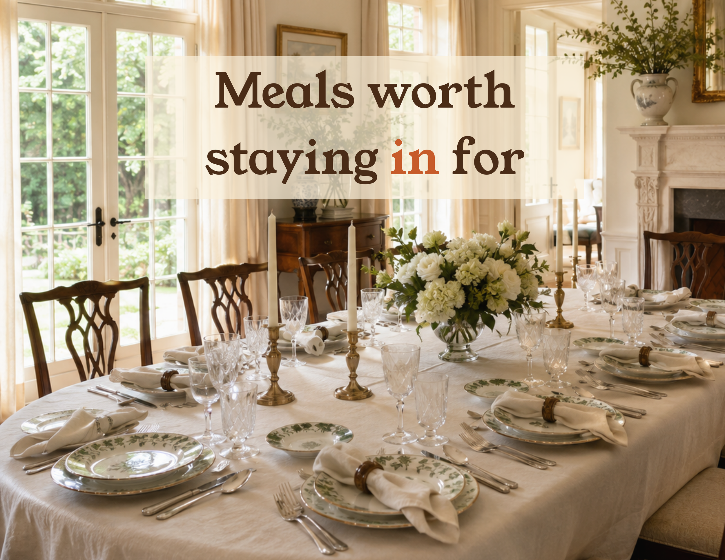 Elegant private dinner table set for guests with flowers, candles and place settings.