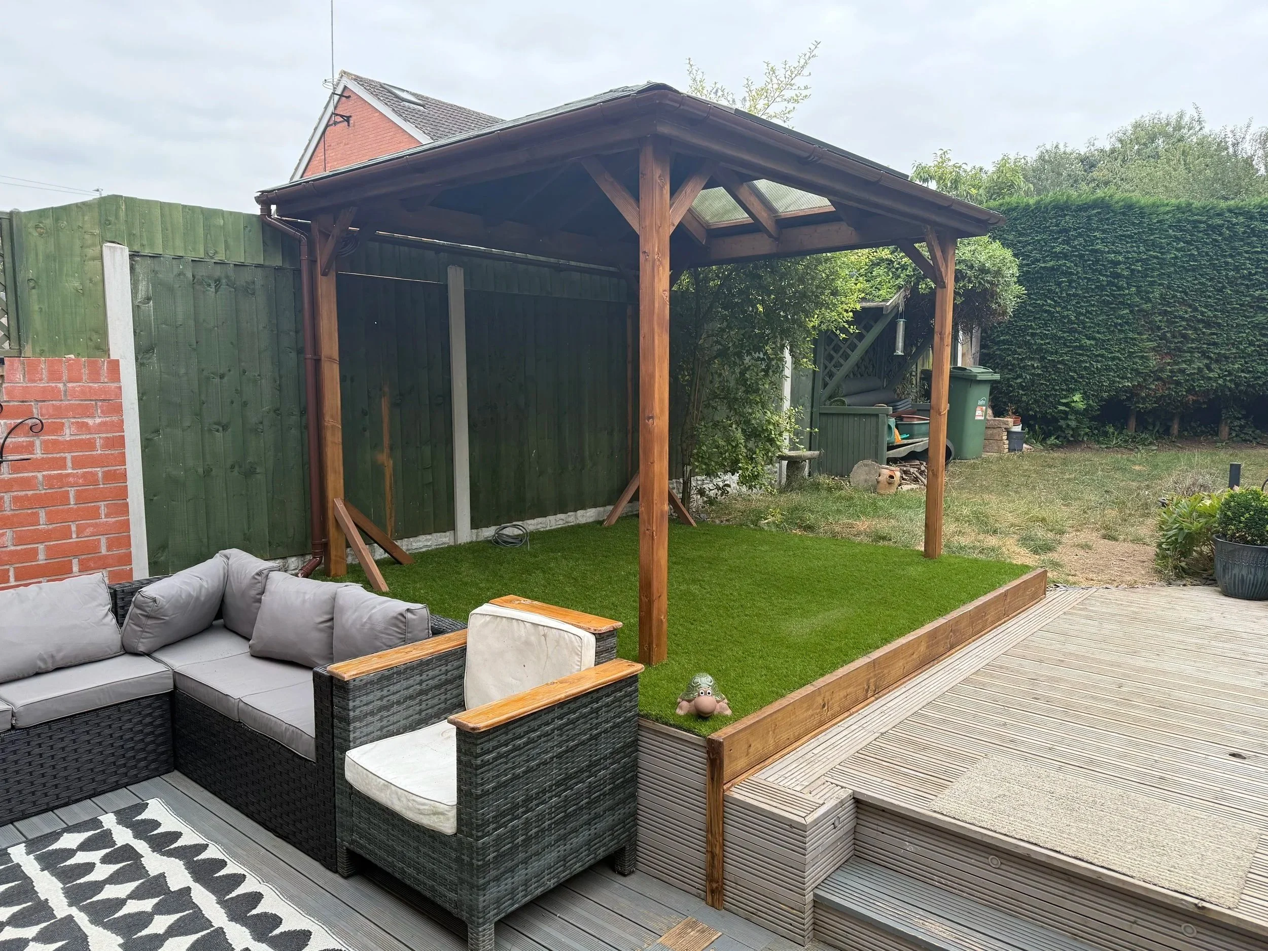 need somewhere cool to sit in the summer or just a place to put your hot tub this covers it all 
 
