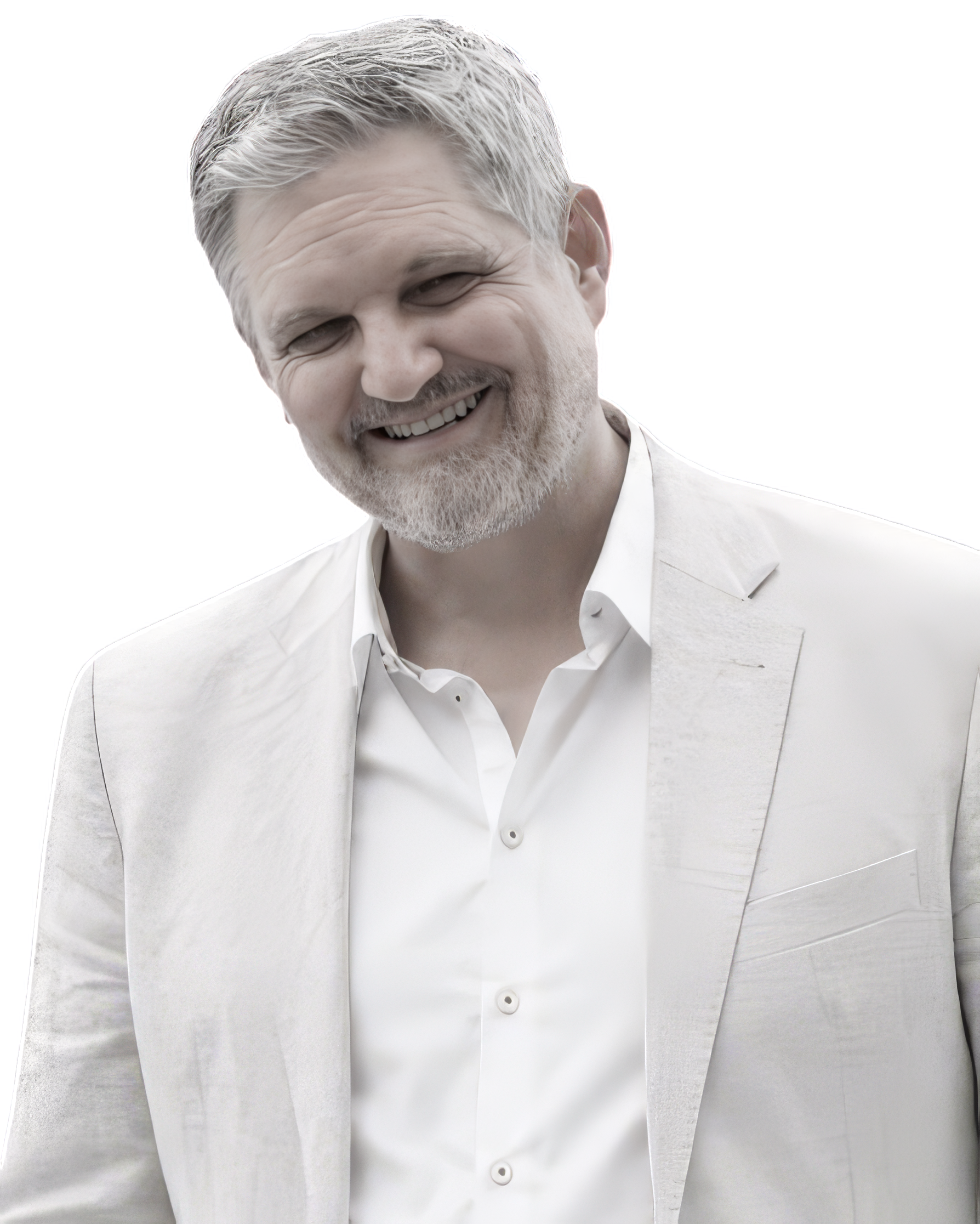 Headshot of smiling male tutor with short locks wearing a lanyard.