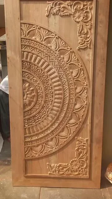 Intricate Carved Wooden Panel