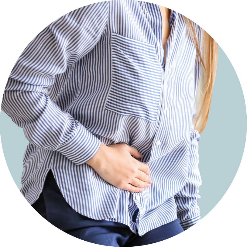 Person wearing a blue and white striped shirt, holding their stomach in pain.