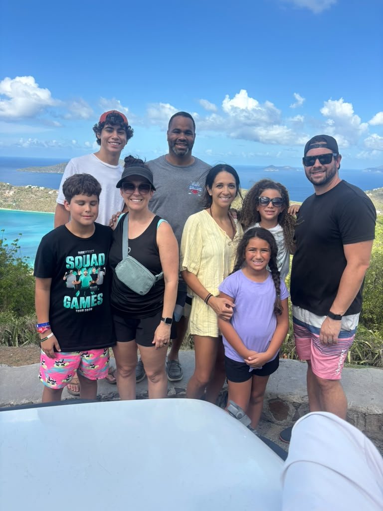 Family memories with a breathtaking view! This family stopped at Drake’s Seat to enjoy the stunning scenery of Magen's Bay and capture a special moment during their St. Thomas island adventure with Jay’s Experience.