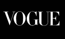 Vogue magazine logo on a black background.