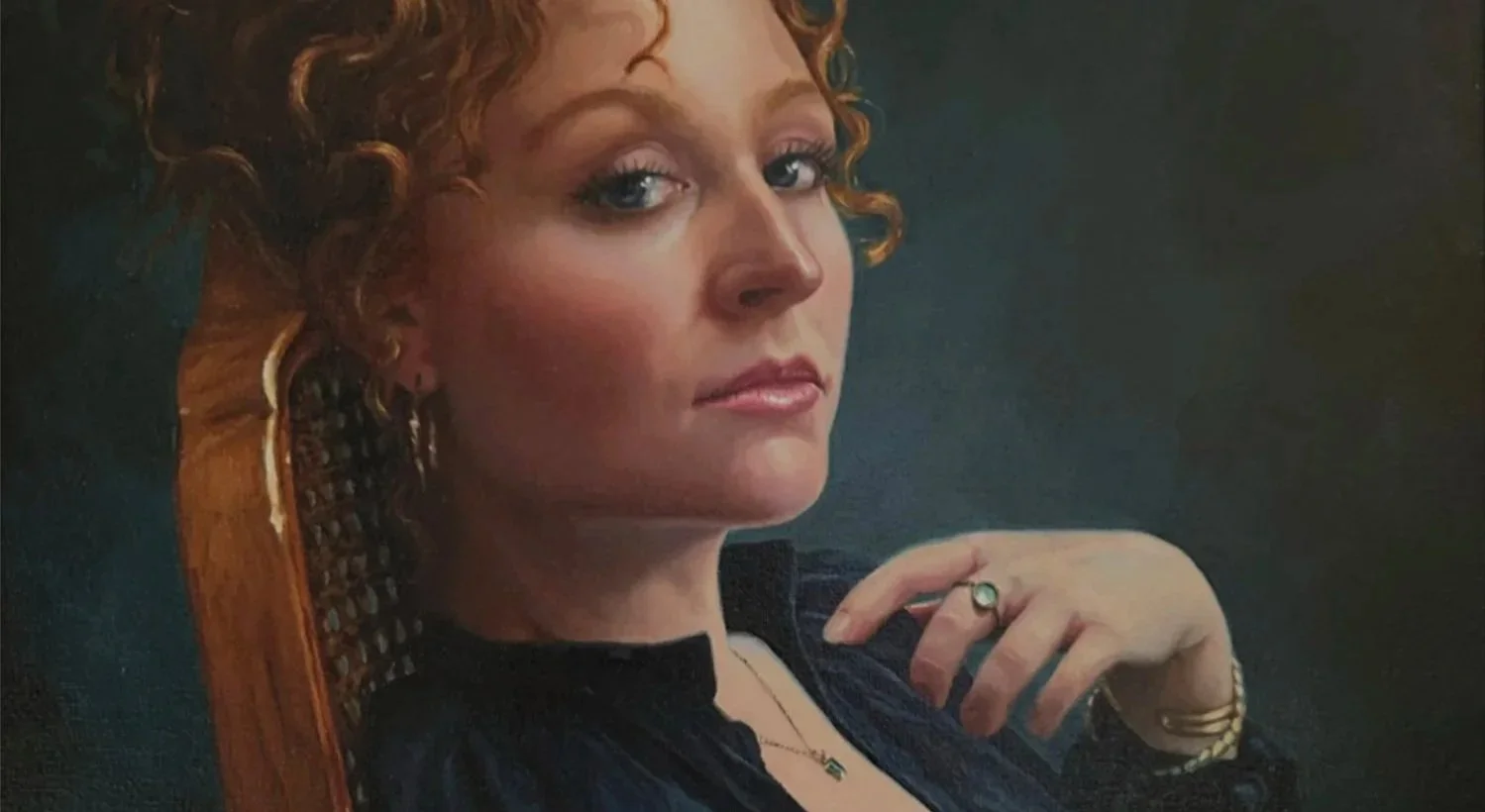Classical portrait of a woman with curly red hair and fair skin, wearing jewelry, looking at the camera with a neutral expression, seated in front of a dark background.