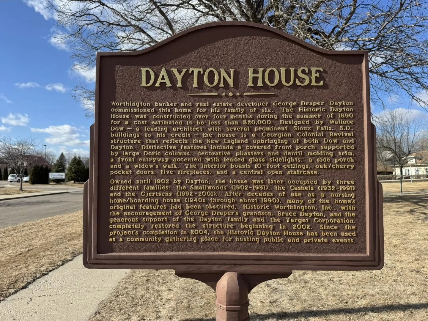 Historical marker for Dayton House, a historic home built in 1890, located in Sioux Falls, South Dakota. The sign provides details about the house’s architecture, history, owners, and restoration.