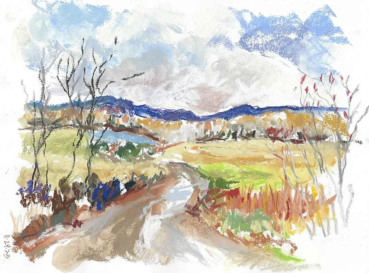 A watercolor landscape of a rural dirt road winding through fields with autumn trees and distant hills under a cloudy sky.