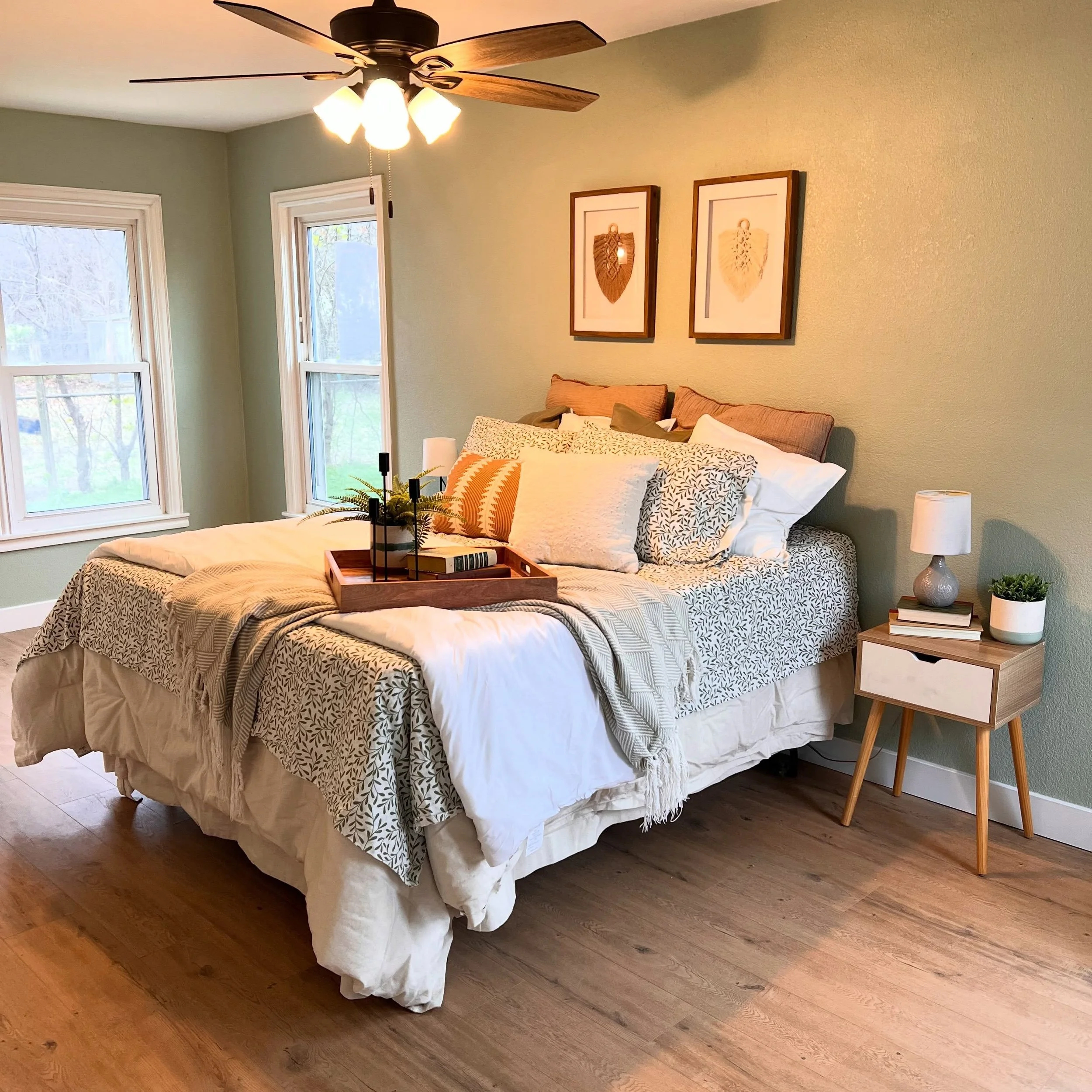 A freshly painted bedroom brings such a sense of relaxation and completion! Here BM Antique Jade provides serenity through a light green tone. This room was also cleanly trimmed in SW Extra White. We would love to help restore a sense of rest to your