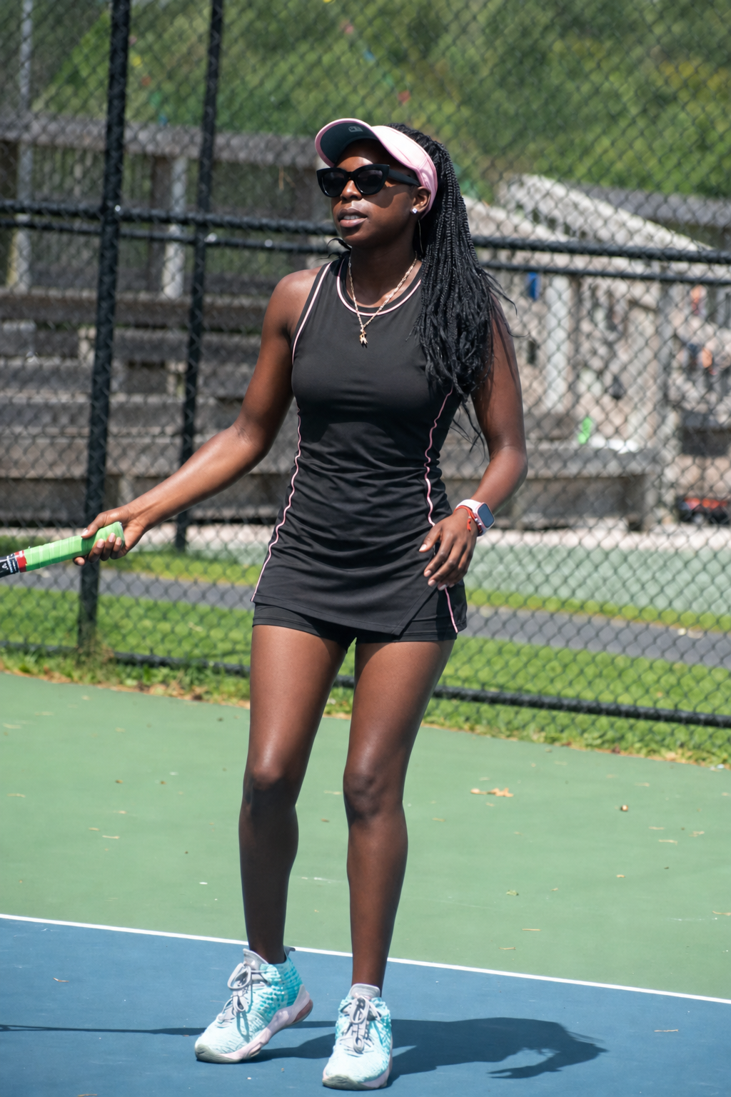Makayla Butler standing on a tennis court