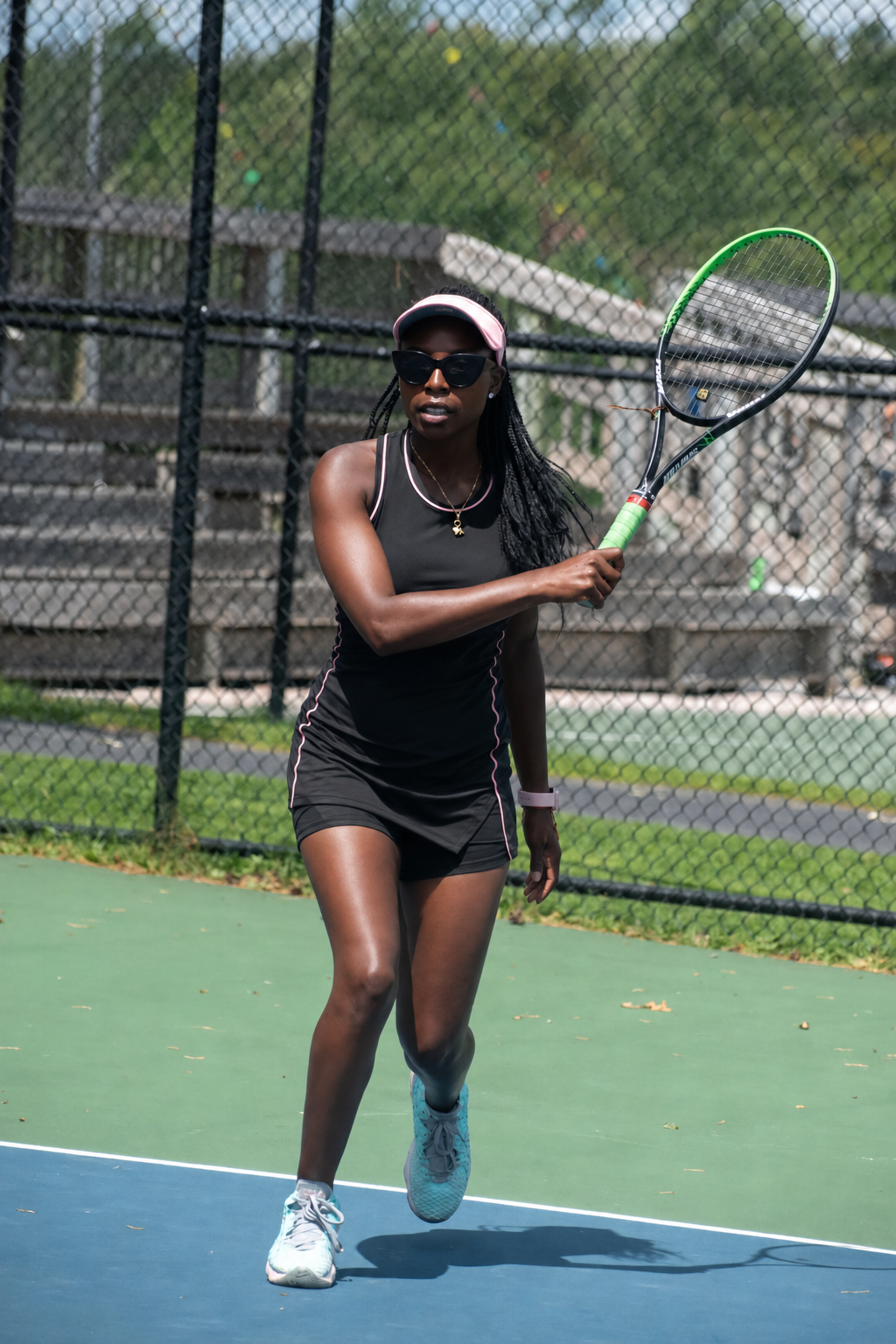 Makayla Butler moving forward on a tennis court