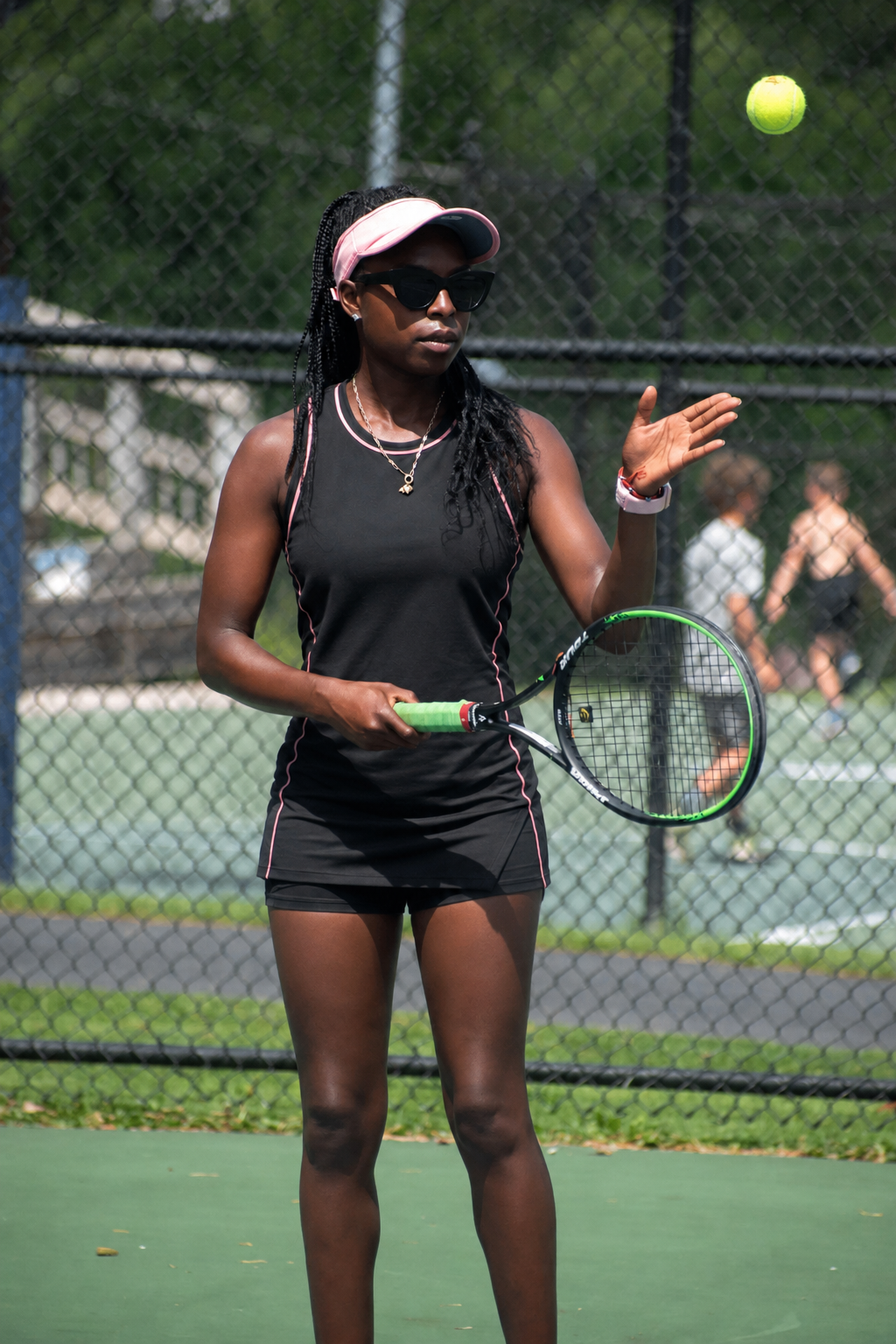 Makayla Butler preparing to serve on court