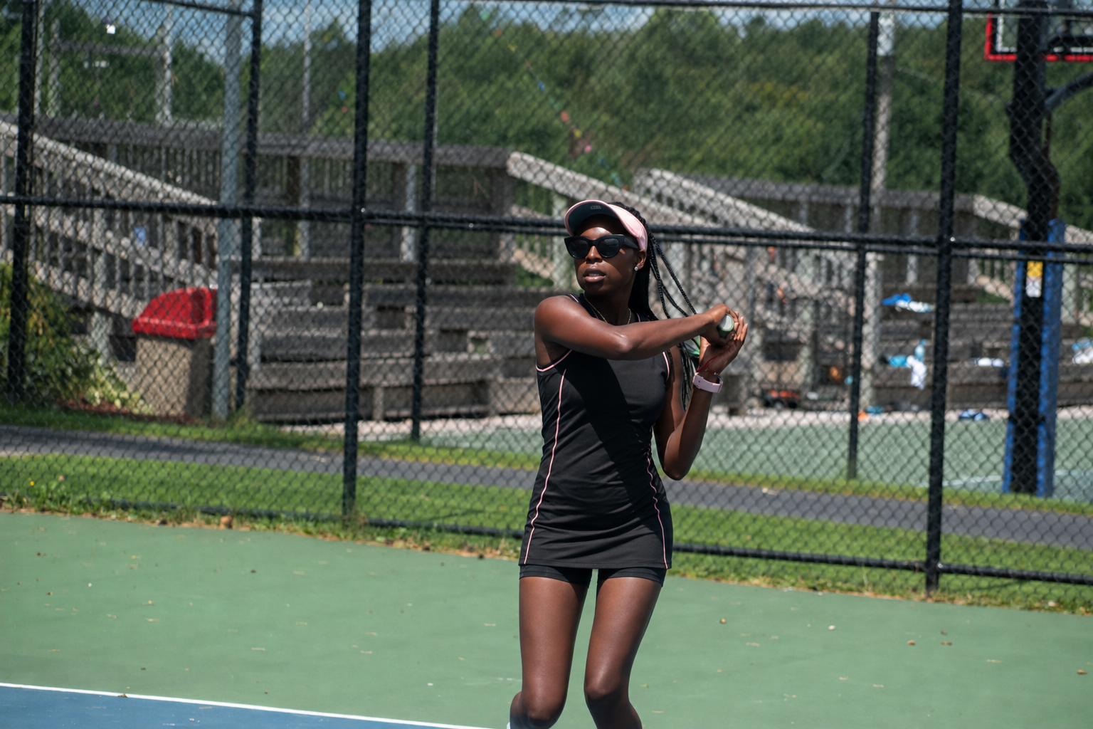 Makayla Butler’s tournament-ready black tennis dress.png