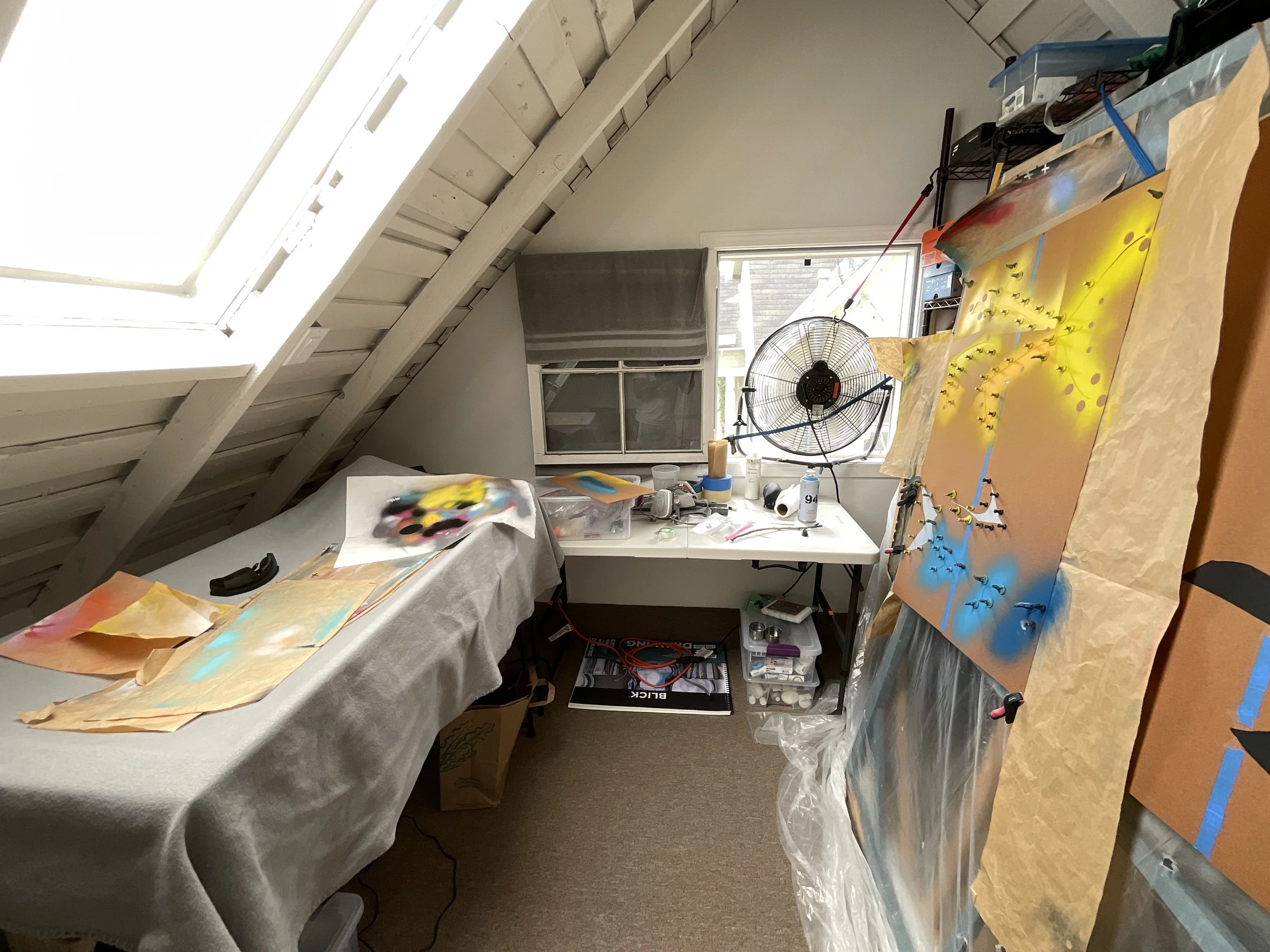 art studio with supplies everywhere