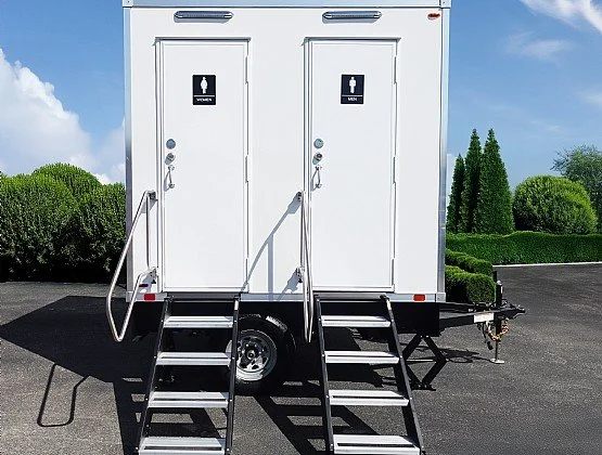 Two stall portable restroom trailer by Northern Thrones. Based in Marquette, MI. Servicing Michigans Upper Peninsula