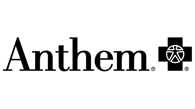 Silhouette of a dog on a skateboard against a solid black background, with a small circular logo in the bottom right corner.