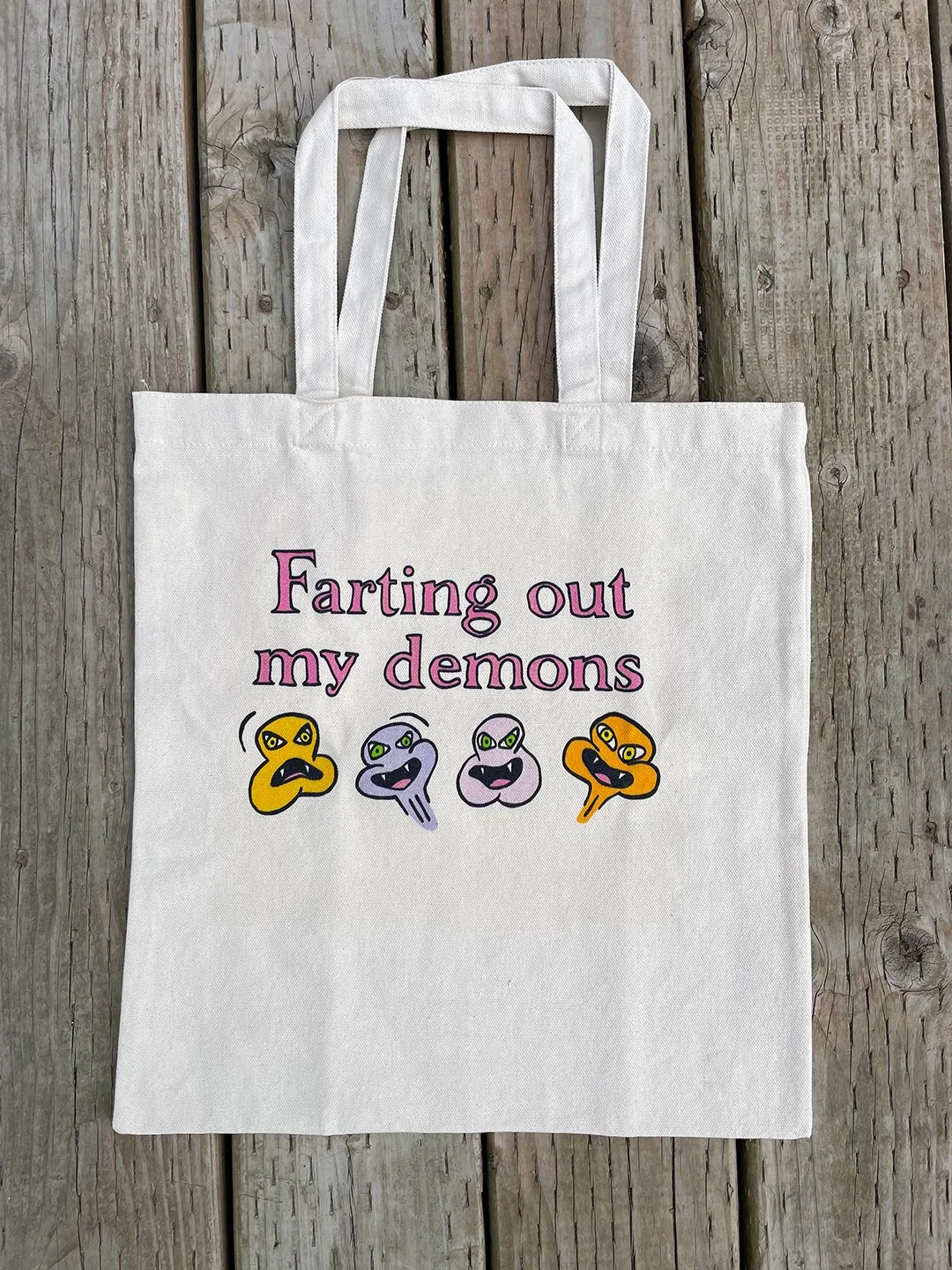 Farting Out My Demons Tote Bag by Mental Cramps