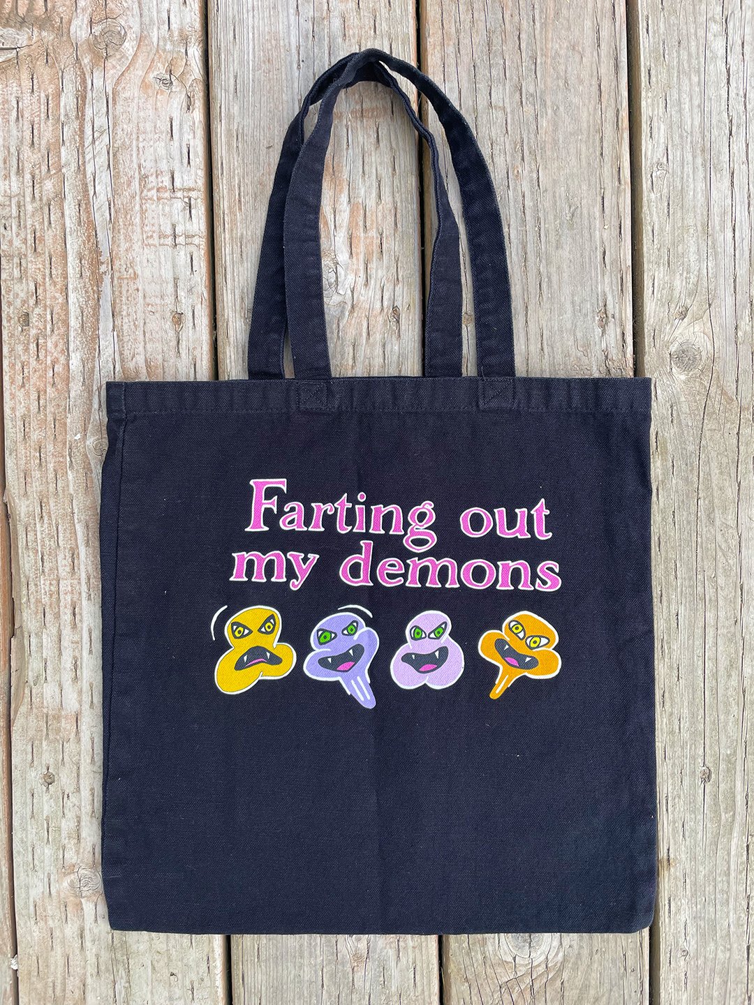 Farting Out My Demons Tote Bag by Mental Cramps